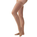 Jobst Ultrasheer Thigh-High Compression Stockings 15-20 mmHg in Natural offer effective leg health support and stylish relief for improved circulation and comfort throughout the day, Moovkart.
