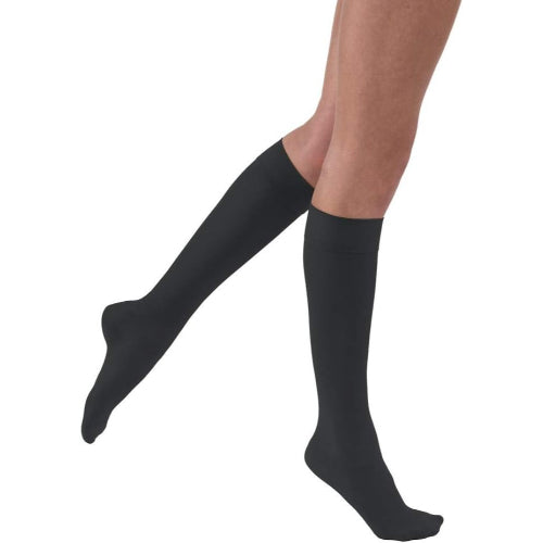 Jobst Ultrasheer 20-30mmHg Closed-Toe Knee-High Compression Socks in black enhance venous health by reducing swelling. Moovkart.