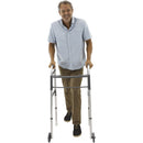 Vive Health Economy Walker with Wheels in use, showcasing durable aluminum frame and adjustable height, Moovkart